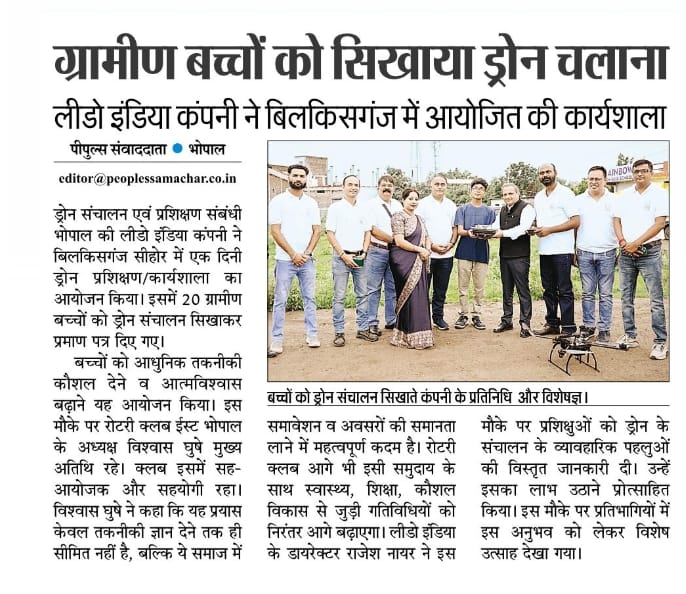 Business section clipping showing SkyHigh CEO receiving industry award with golden drone trophy